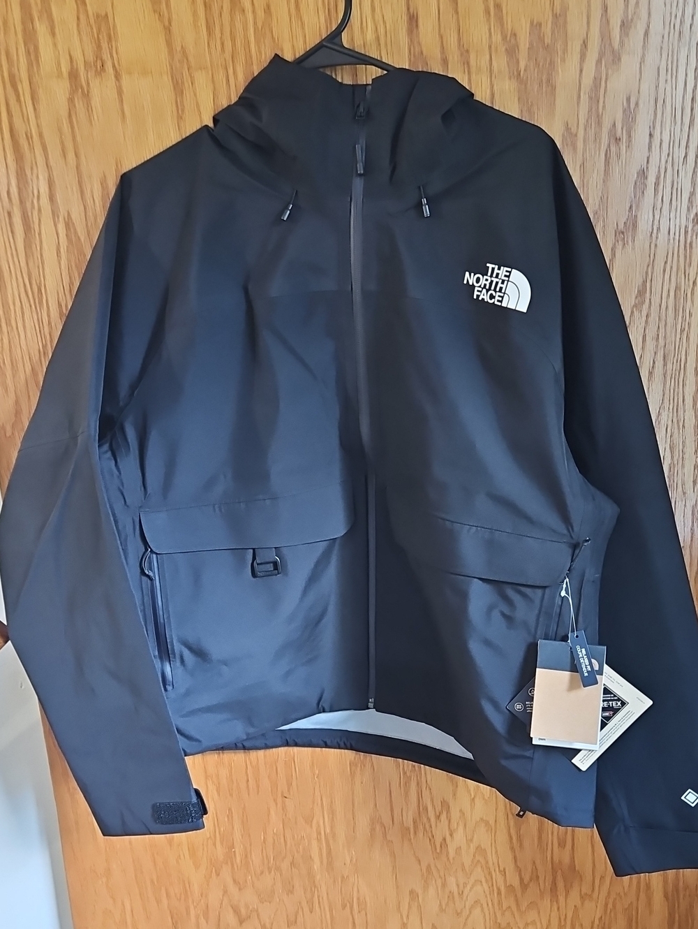 The North Face Women's Gortex Black Hooded Raincoat with Logo